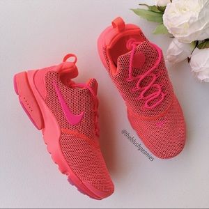 all pink nike shoes